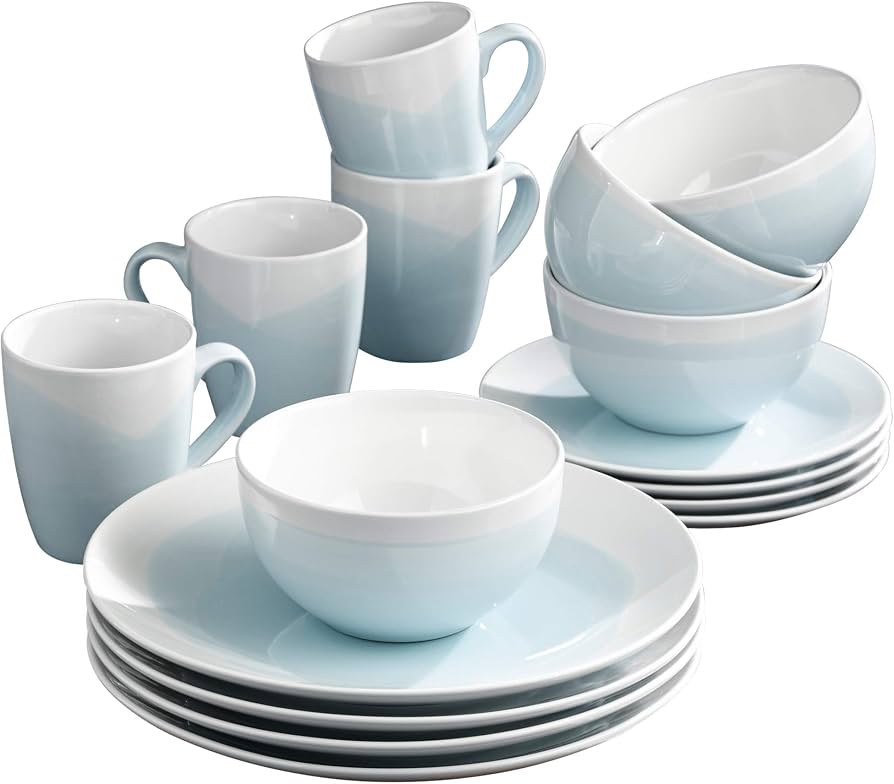 Artisanal ceramic tableware on oak table